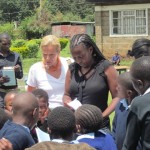 Lucy and Mama Hanne with children at school