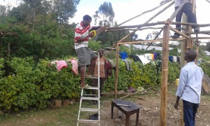 African Hut-Roofing-Daniel, Tchr Peter